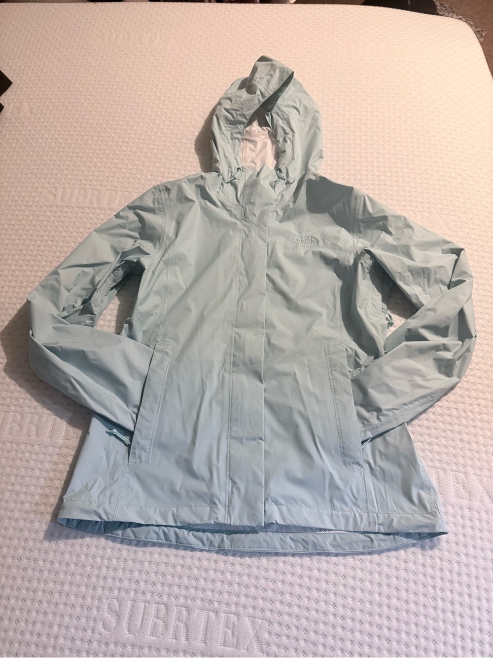 Women’s North Face Light Blue Rain Coat